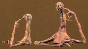 The thinker among aliens.png