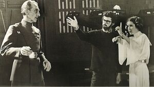 Peter Cushing George Lucas Carrie Fisher filming Star Wars.jpg