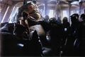 Leia sitting beside Jabba on the sail barge